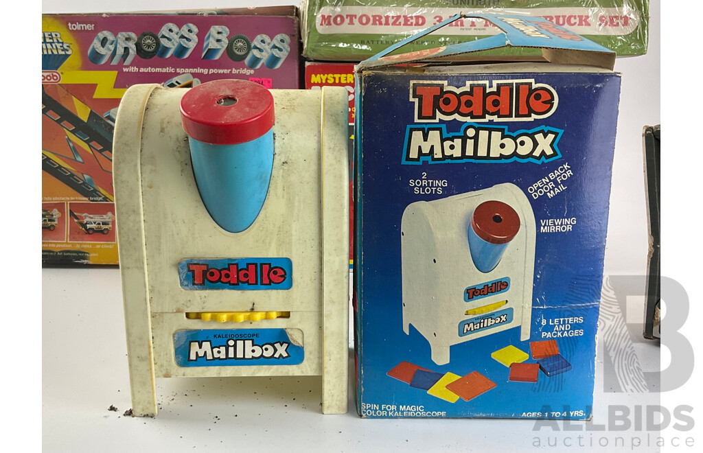 Collection of Boxed Vintage Toys Including Tolmer Cross Boss Pick Up, Toddle Mail Box Kaleidoscope, Little Steps Wooden Crane, Mystery Action Electronic Melody Loco