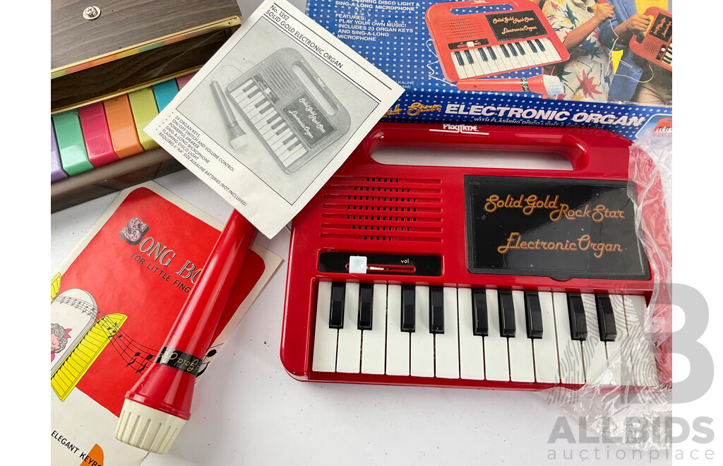 Vintage Inoue Eighteen Key Grand Piano and Playtime Solid Gold Rock Star Electronic Organ in Original Packaging