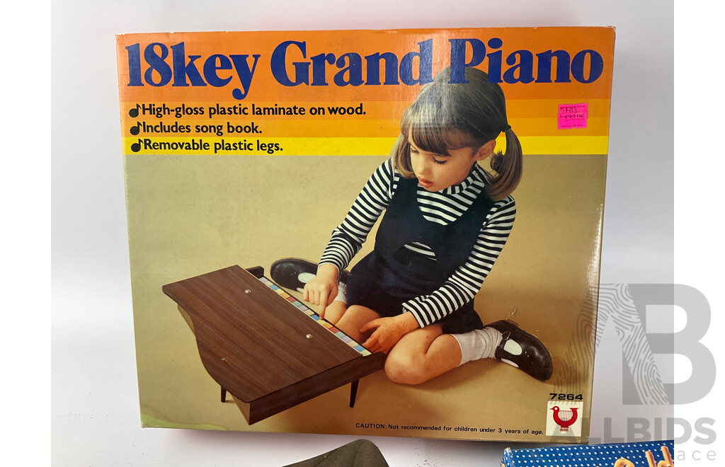 Vintage Inoue Eighteen Key Grand Piano and Playtime Solid Gold Rock Star Electronic Organ in Original Packaging