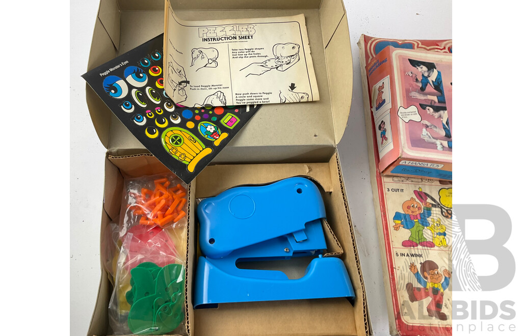 Collection of Vintage Toys and Games Including Shrinky Dinks, Kiddicraft Pram Ducks, Peggles, Printing Set Expendable Turbo Racer, Mako Model Molding and My First Puzzles, All in Original Packaging