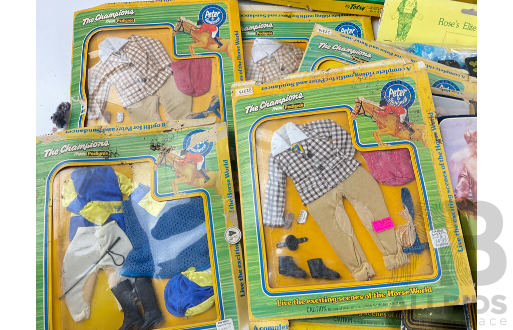 Collection of Vintage Doll Clothing in Original Packets Including Cabage Patch Doll Garden Needs and Rose's Elite Doll's Fashions, Mini-Mod and Pedigree 'The Champions'