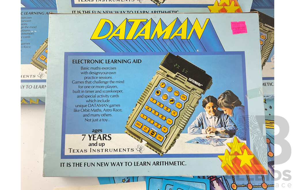 Four Vintage Texas Instruments Data Man Electronic Learning Aids in Original Packaging