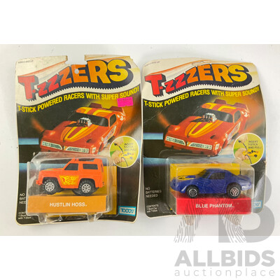 Two Vintage Toltoys T-zzzers T Stick Powered Racers, Blue Phantom and Hustlin Hoss in Original Packaging