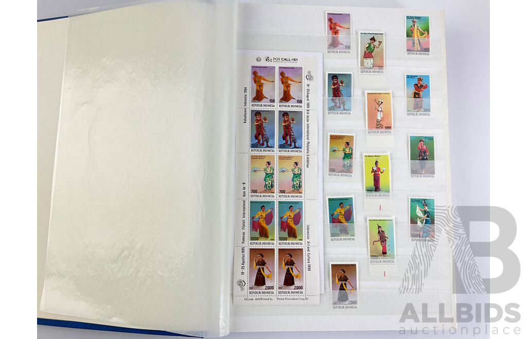 Album of International Stamps, Cancelled, Mintstrips, Blocks Including USA, Indonesia, India, Malta and More