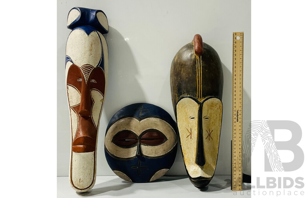 Collection Three Hand Carved and Decorated Wooden African Masks