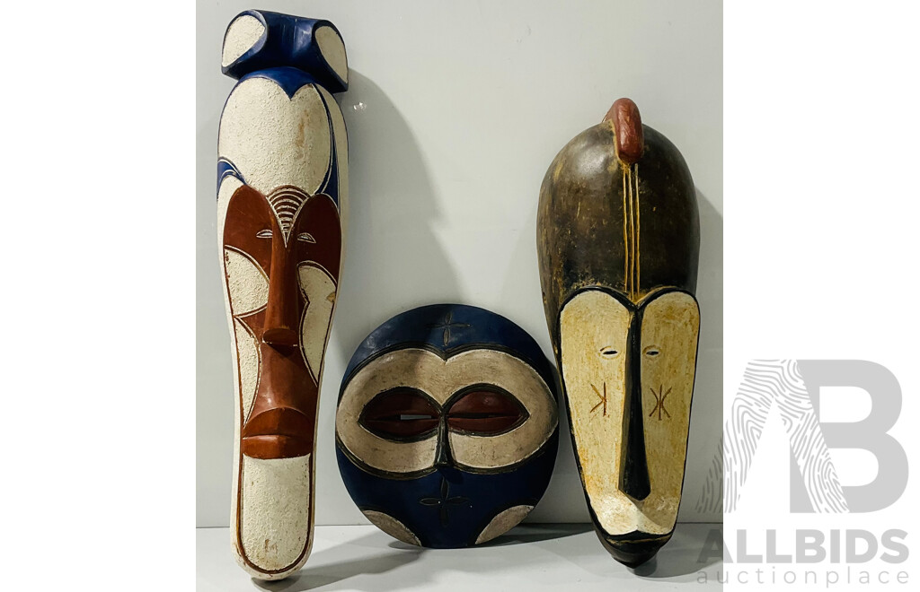 Collection Three Hand Carved and Decorated Wooden African Masks