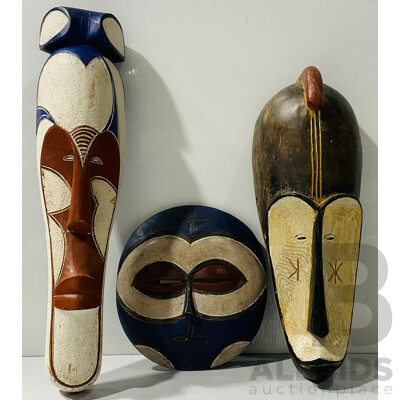 Collection Three Hand Carved and Decorated Wooden African Masks