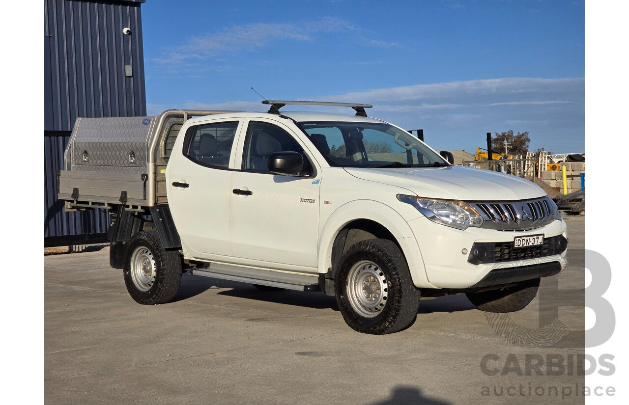 9/2015 Mitsubishi Triton GLX (4x4) MQ MY16 4d Dual Cab Chassis White Turbo Diesel 2.4L