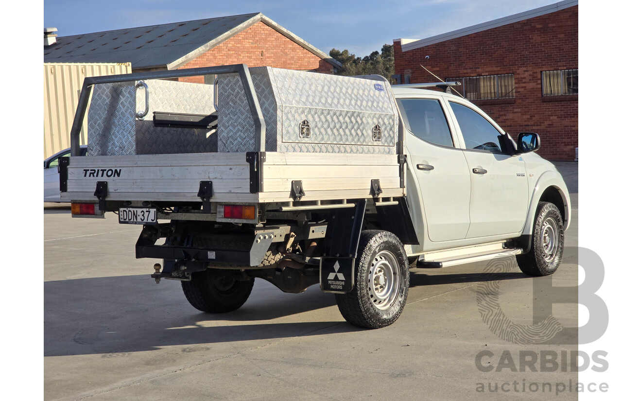 9/2015 Mitsubishi Triton GLX (4x4) MQ MY16 4d Dual Cab Chassis White Turbo Diesel 2.4L