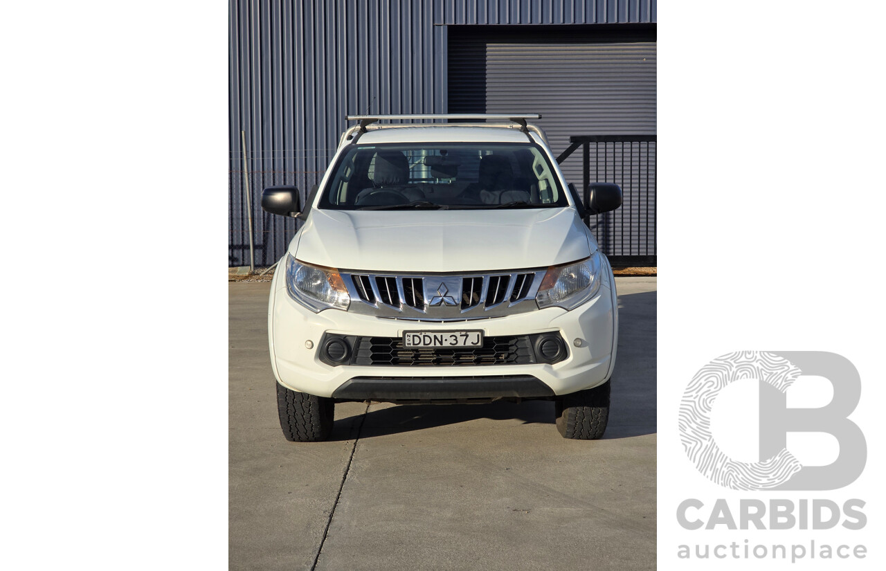 9/2015 Mitsubishi Triton GLX (4x4) MQ MY16 4d Dual Cab Chassis White Turbo Diesel 2.4L