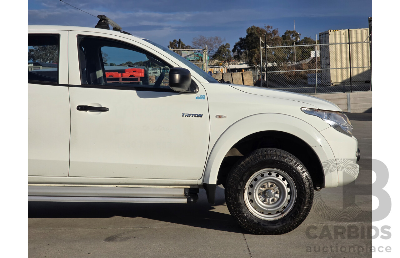 9/2015 Mitsubishi Triton GLX (4x4) MQ MY16 4d Dual Cab Chassis White Turbo Diesel 2.4L