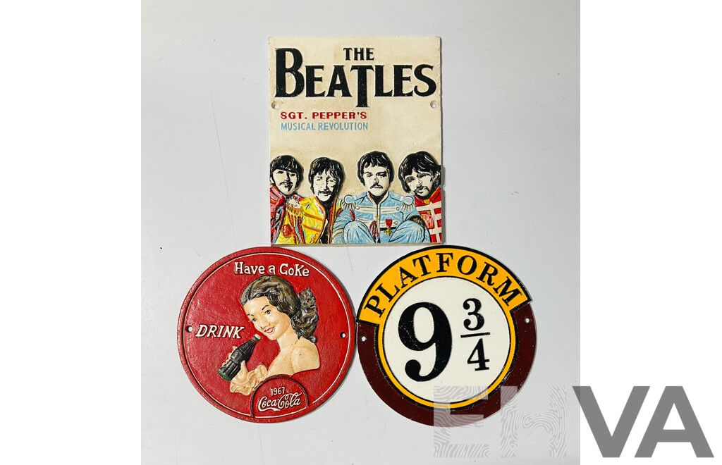 Collection of Three Reproduction Cast Iron Wall Signs Including Platform 9 3/4 Sign, Coca-cola Sign and the Beatles