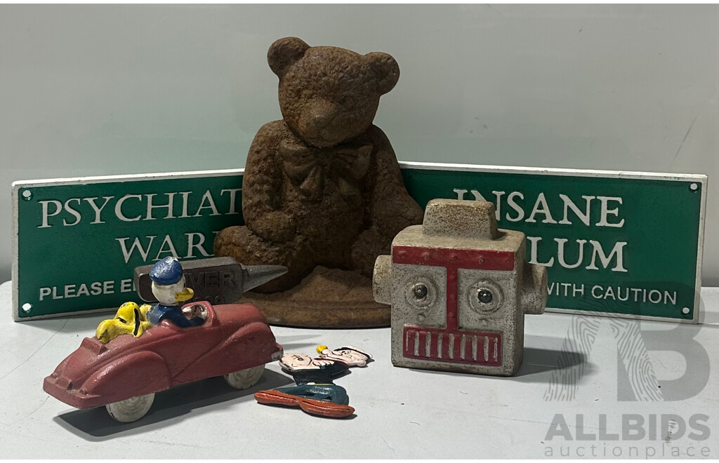 Various Reproduction Signs and Popeye Book Holder and More