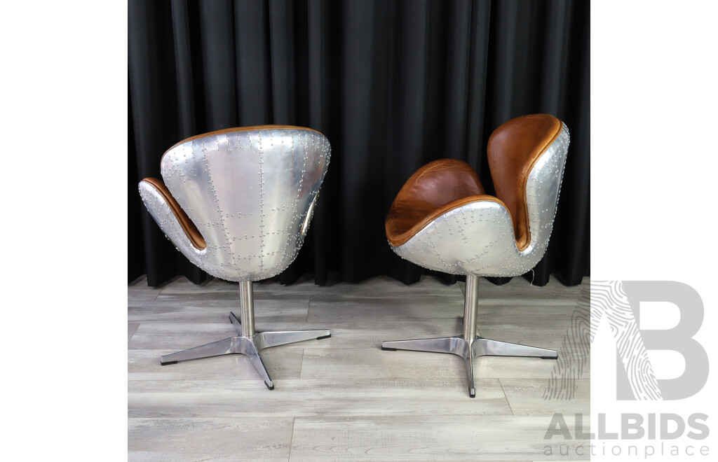 Pair of Swan Style Swivel Chairs with Riveted Alloy Casing