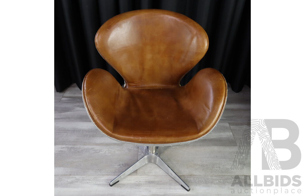 Pair of Swan Style Swivel Chairs with Riveted Alloy Casing