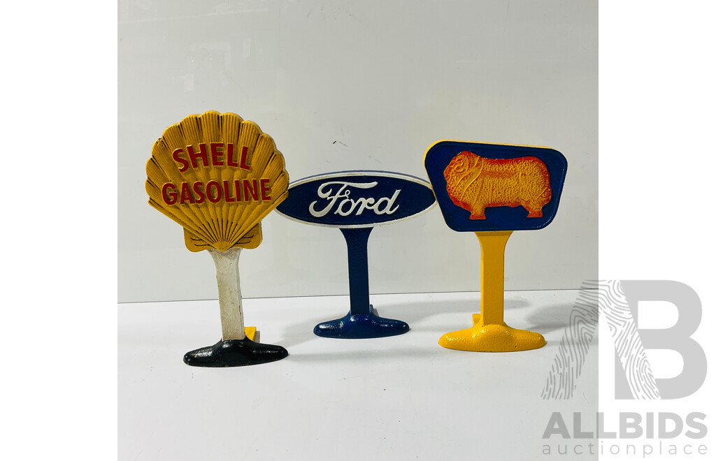 Collection of Three Reproduction Cast Iron Automobilia Door Stops