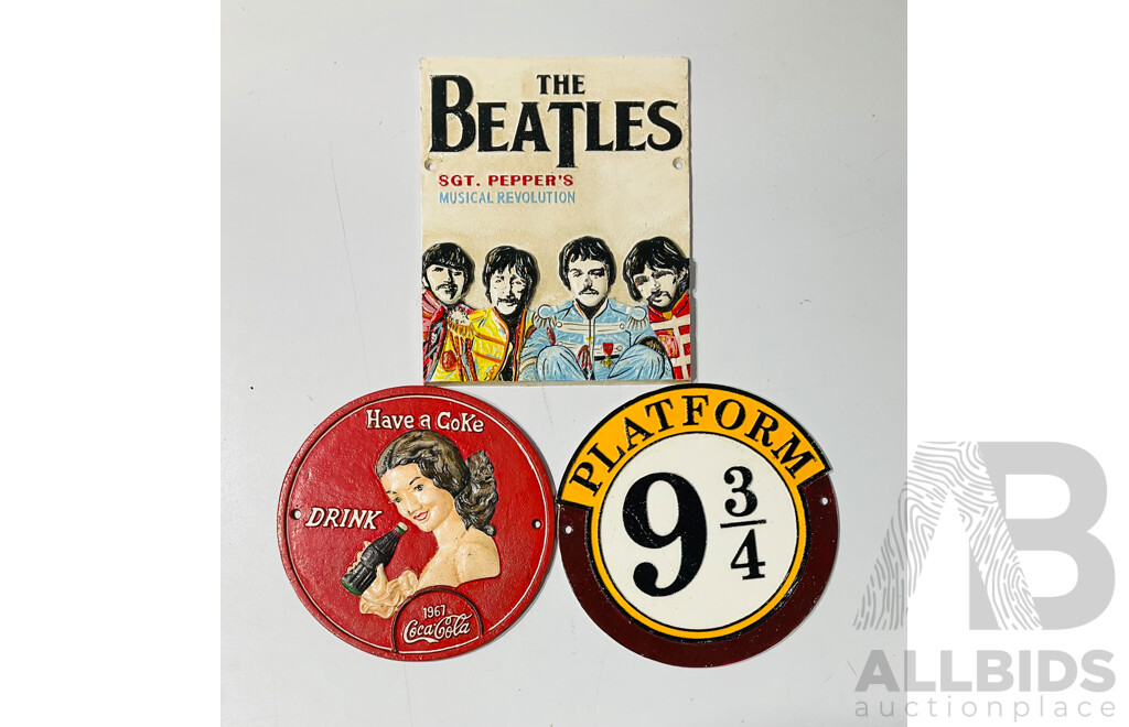 Collection of Three Reproduction Cast Iron Wall Signs Including Platform 9 3/4 Sign, Coca-cola Sign and the Beatles