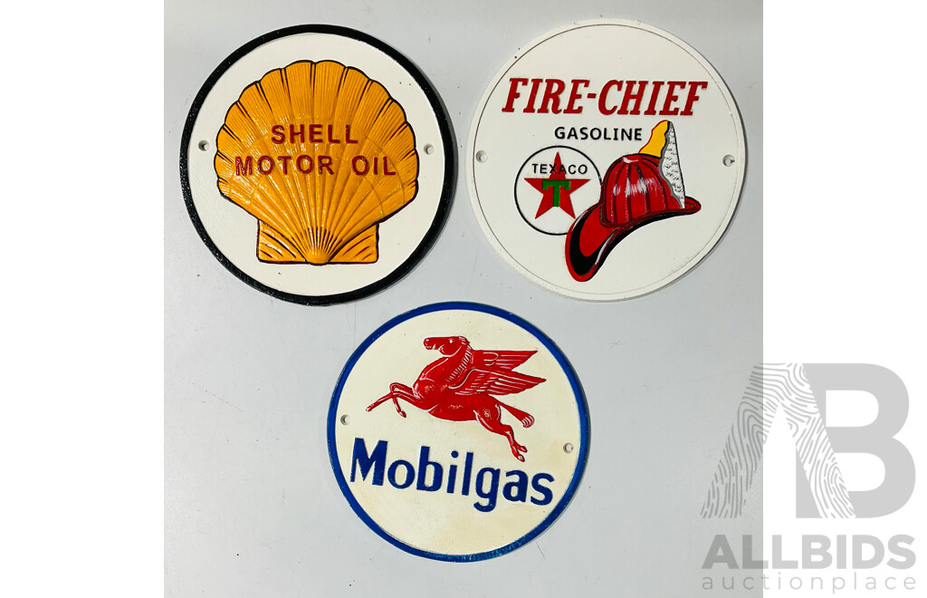 Collection of Three Cast Iron Reproduction Automobilia Wall Signs Including Shell, Fire-chief and Mobilgas