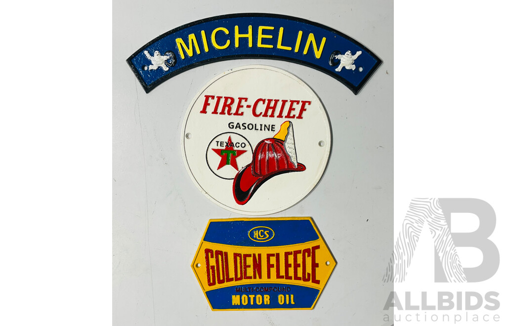 Collection of Three Cast Iron Reproduction Automobilia Signs Including Michelin Tires, Fire-chief Gasoline and Golden Fleece Motor Oil