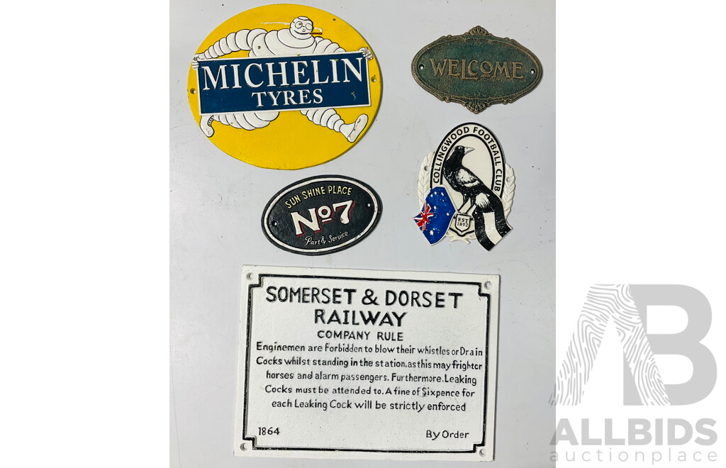 Collection of Reproduction Painted Cast Iron Signs Including Michelin Tyres, Collingwood Football Club and More