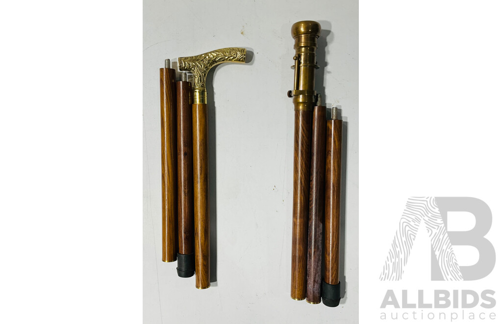 Pair of Wooden Canes Including One with Detailed Metal Hand,e and One with Compass Head