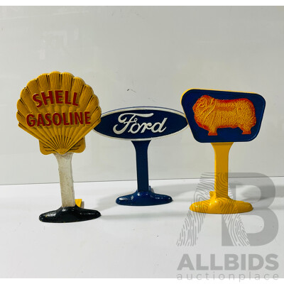 Collection of Three Reproduction Cast Iron Automobilia Door Stops