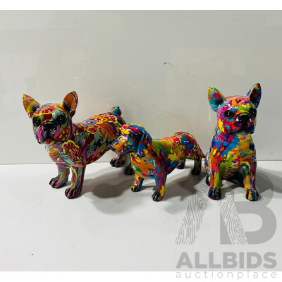 Collection of Three Composite Dog Statues with Interesting Patterns