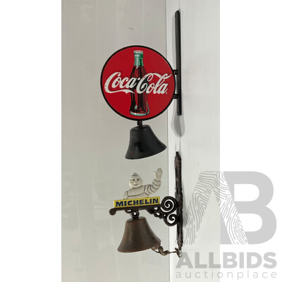 Pair of Cast Iron Reproduction Coca-cola and Michelin Tires Wall Mounted Bells