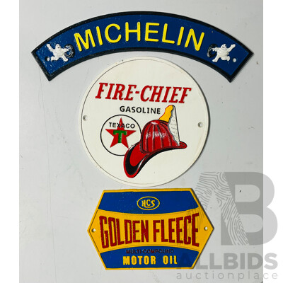 Collection of Three Cast Iron Reproduction Automobilia Signs Including Michelin Tires, Fire-chief Gasoline and Golden Fleece Motor Oil