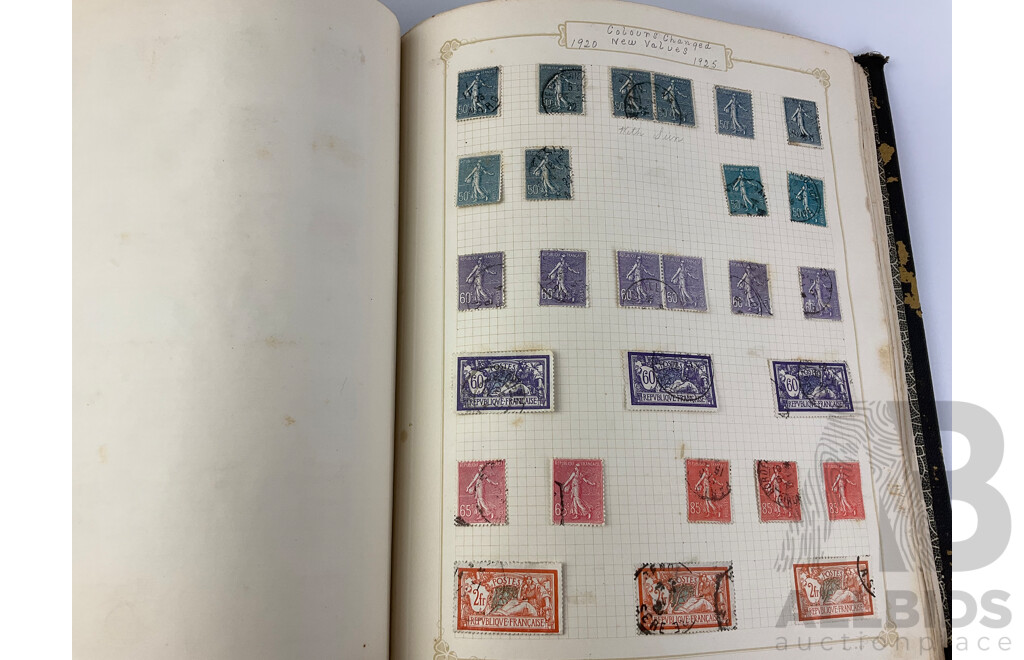 Two Albums of Antique and Vintage Hinged Stamps Including French Colonies, USA, Greece, Papua, United Kingdom, Russia and More
