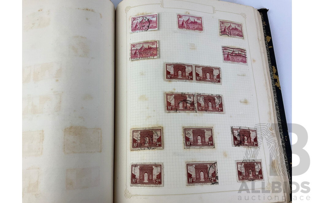 Two Albums of Antique and Vintage Hinged Stamps Including French Colonies, USA, Greece, Papua, United Kingdom, Russia and More