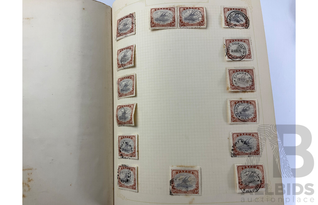 Two Albums of Antique and Vintage Hinged Stamps Including French Colonies, USA, Greece, Papua, United Kingdom, Russia and More