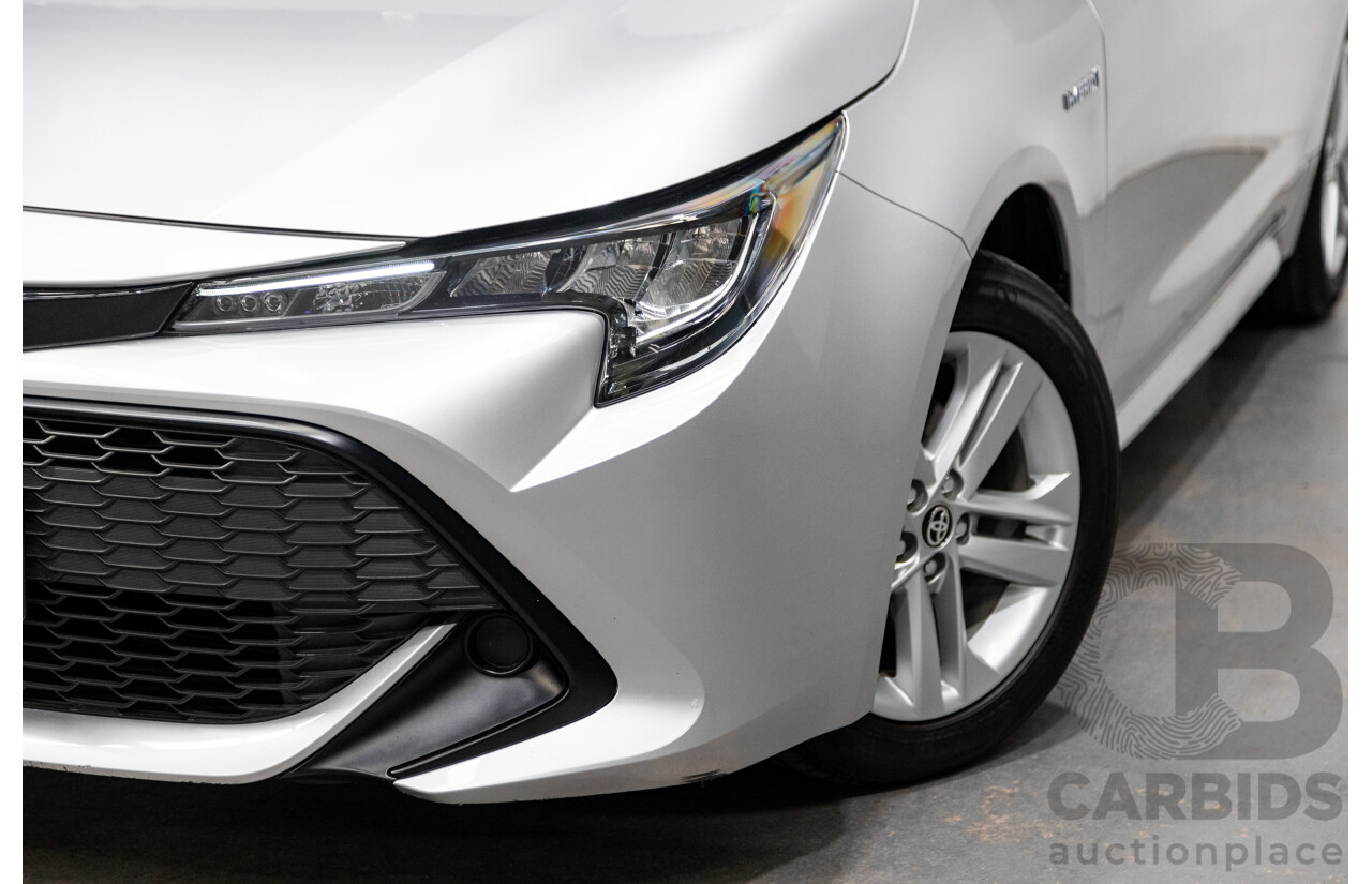 11/2020 Toyota Corolla Ascent Sport Hybrid ZWE211R MY21 4d Hatch Silver Pearl Metallic 1.8L / 90kW Hybrid