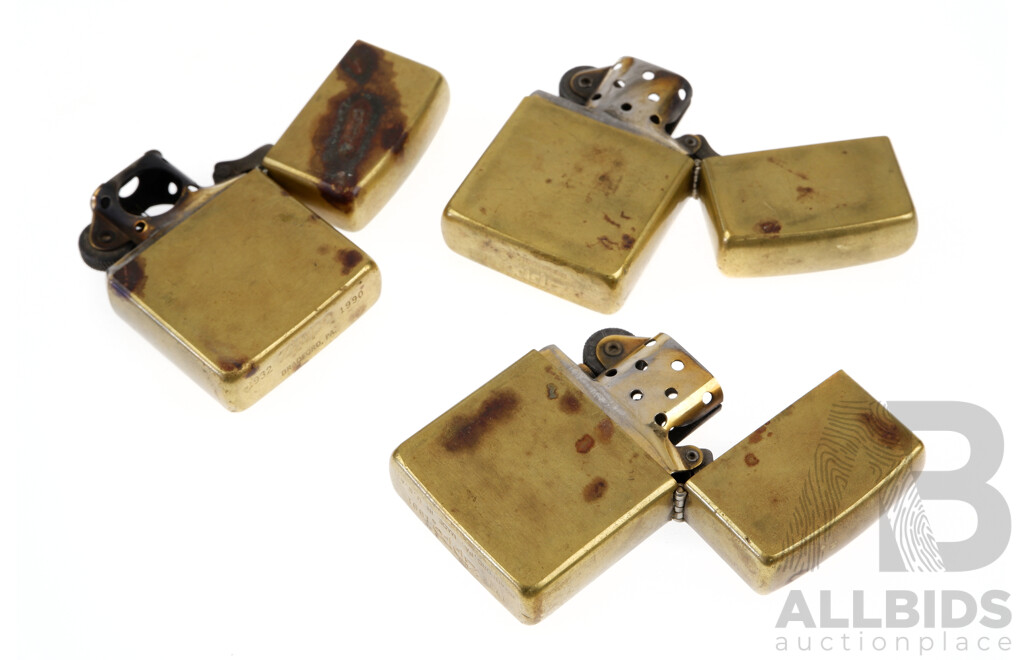 Collection Three Vintage Brass Zippo Lighters