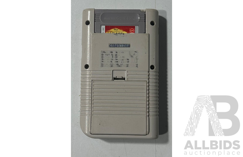 Retro Nintendo GAME BOY Console with the Lion King Video Game Cartridge