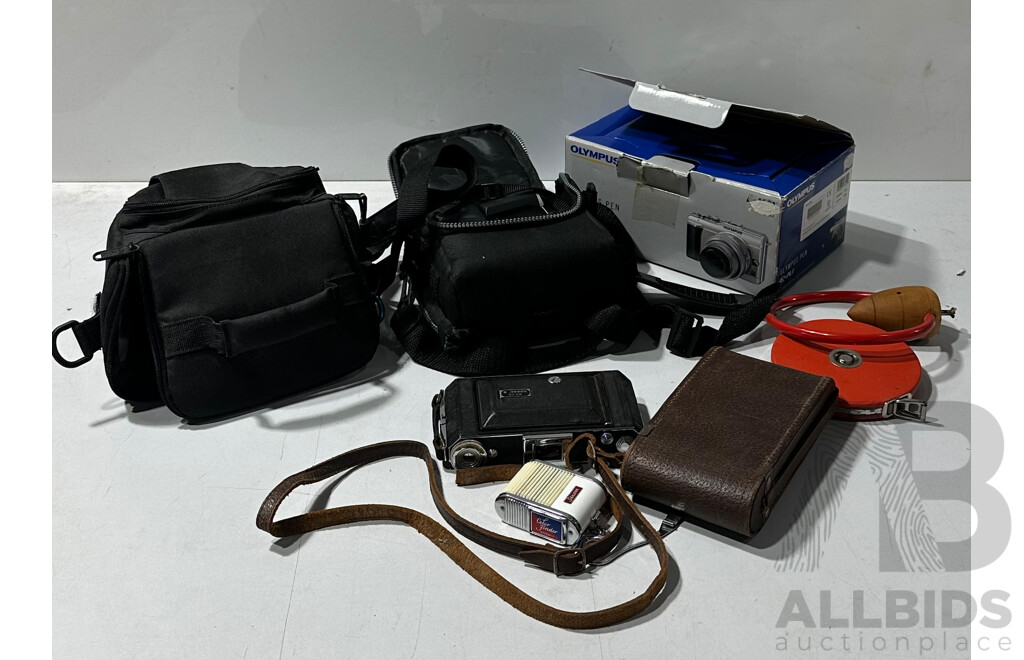 Collection of Modern and Vintage Cameras and Camera Gear Including Panasonic DMC-FZ30 Digital Camera, Olympus E-PL1 and More