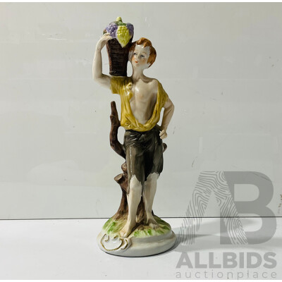 Porcelain Painted Statue of Boy Carrying Fruit