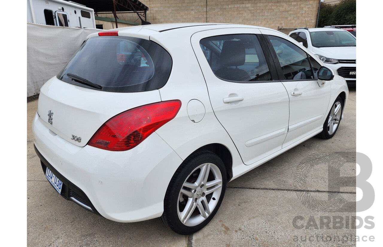 3/2011 Peugeot 308 Sportium  5d Hatchback White 1.6L