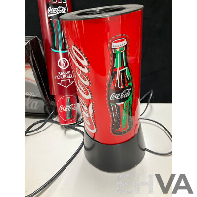 Coca Cola Illuminated Sign and Rotating Cup with Anodized and Plastic Cups, Hanging Signs, Cup Dispenser, Assorted Magnets