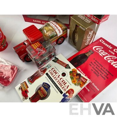 Assortment of Coca Cola Items Including Moulded Wall Clock, Bank Alarm Clock, Diecast Vehicles, Tins, Cups, Collector and Cooking Books