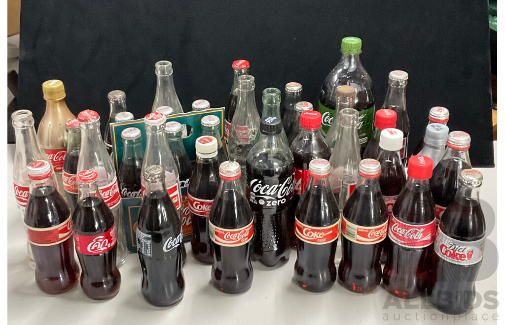 Collection of Vintage Coca Cola Bottles