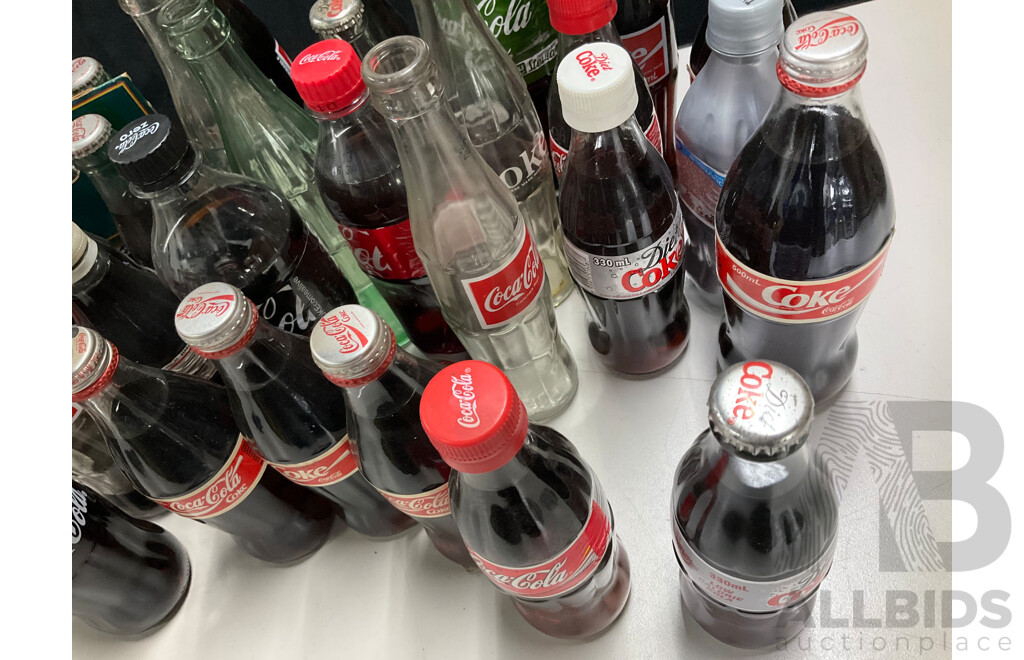 Collection of Vintage Coca Cola Bottles