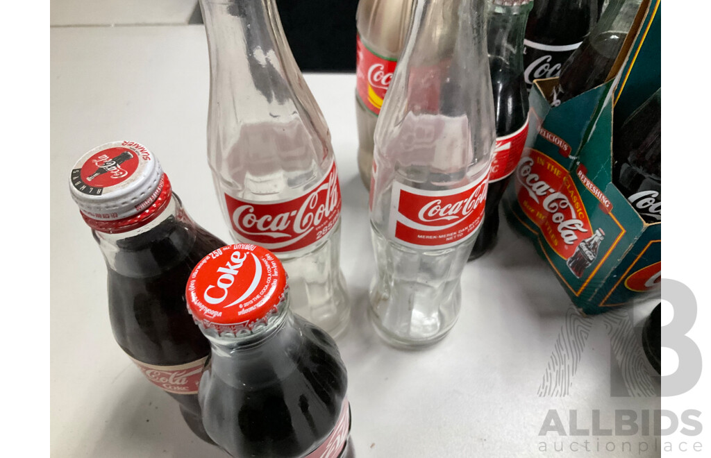 Collection of Vintage Coca Cola Bottles