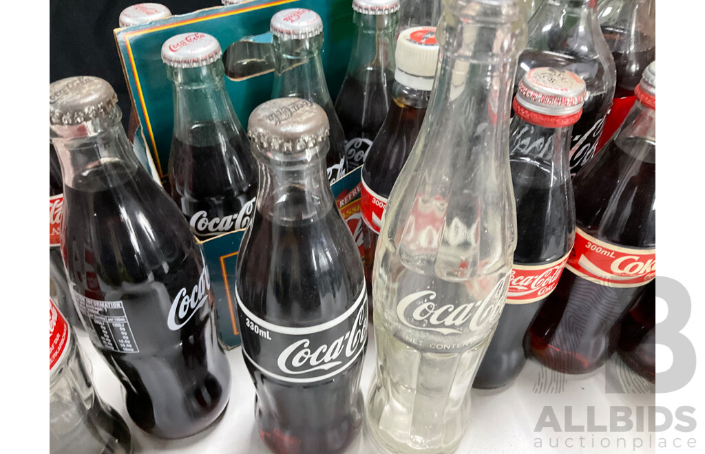 Collection of Vintage Coca Cola Bottles