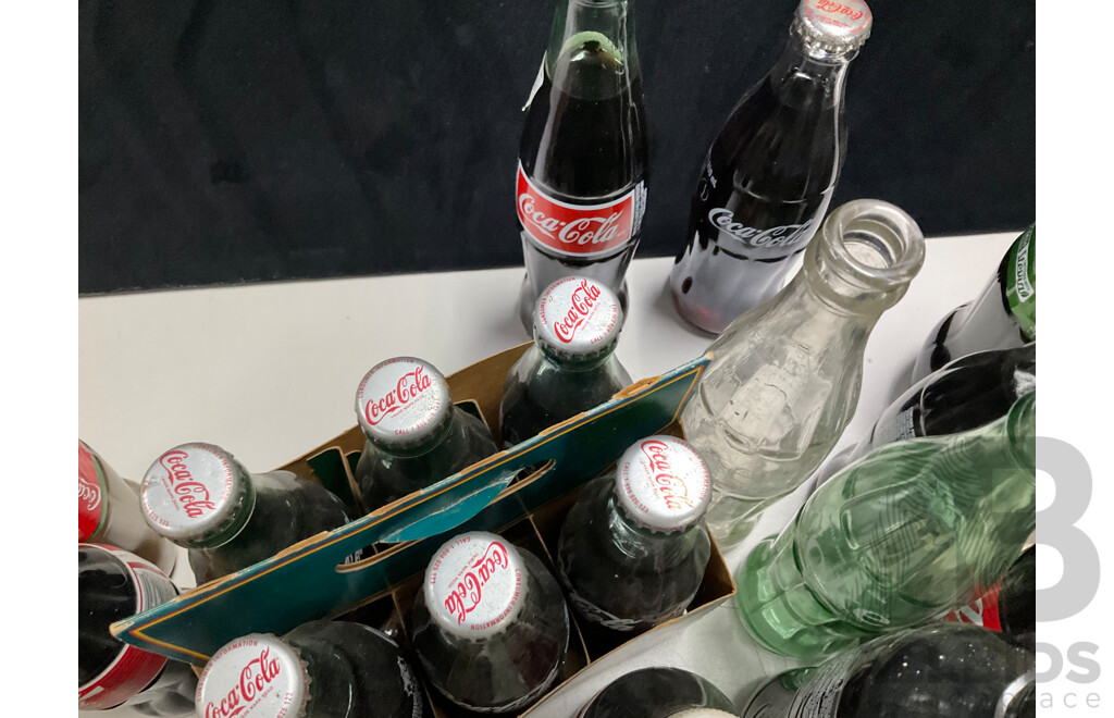 Collection of Vintage Coca Cola Bottles