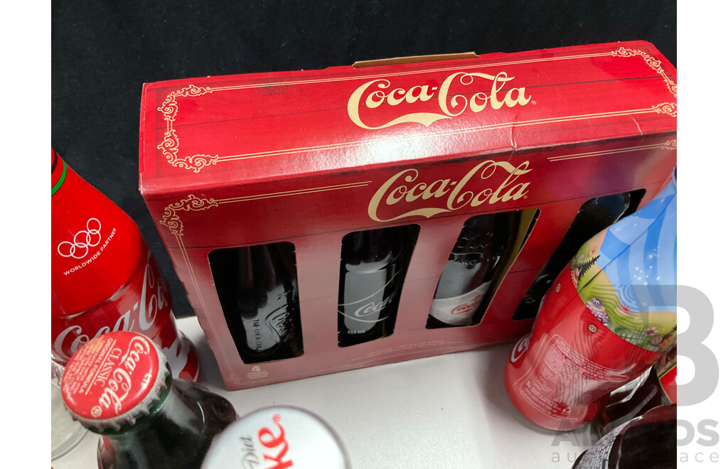 Collection of Vintage and Commemorative Coca Cola Bottles Including Christmas, Olympics and 1987 America's Cup