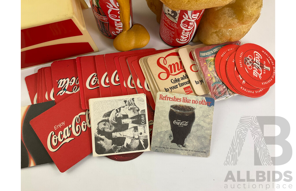 Collection of Coca Cola Merchandise Including Novelty Frothing Coke Cans, Retail and Tin Signs, Coasters, Money Boxes and Art Pack