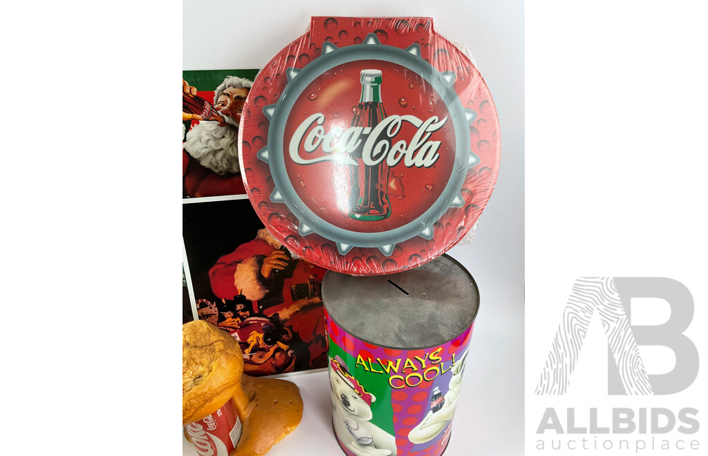 Collection of Coca Cola Merchandise Including Novelty Frothing Coke Cans, Retail and Tin Signs, Coasters, Money Boxes and Art Pack