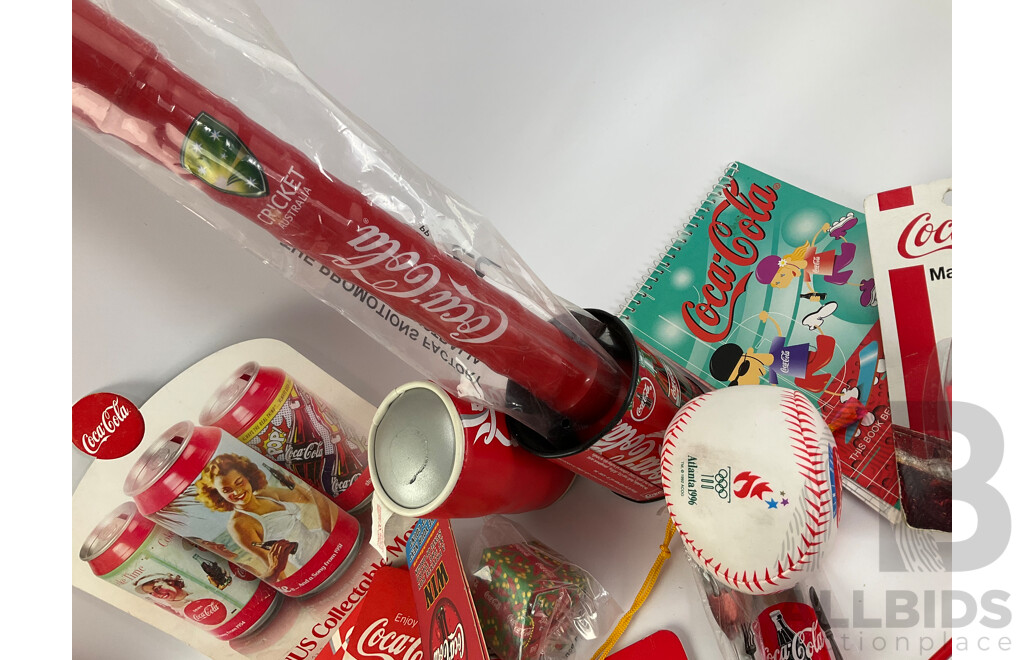 Assortment of Coca Cola Merchandise Including Hanging Illuminated Sign, Lip Smackers, Ice Trays, Pens, Sunglasses, Wallet and More