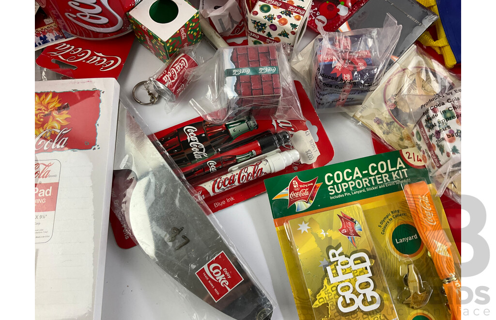 Coca Cola Merchandise Including Vintage Money Tins, Pens, Coasters, Frisbee, Playing Cards, Lip Smackers